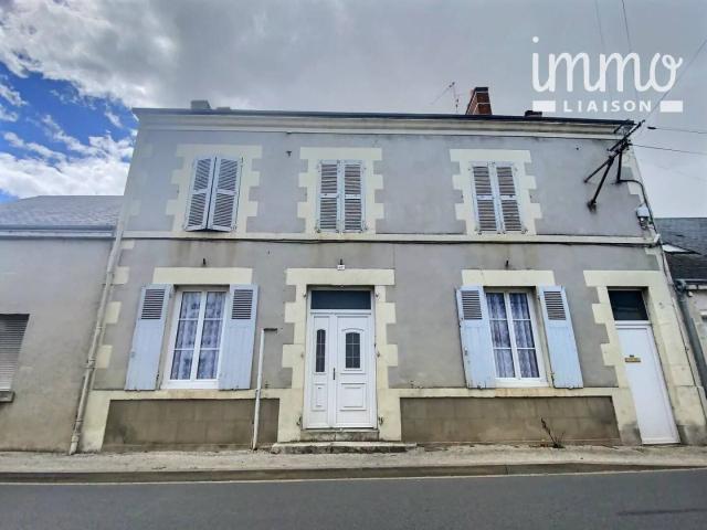 Maison de ville avec garage et jardin