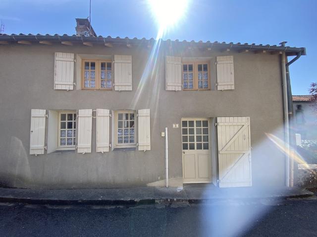 Maison de ville avec garage et terrain non attenant
