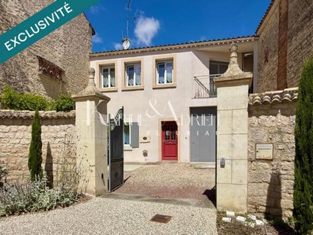 Maison de ville avec grand garage, ascenseur, 4 chambres, jardin et terrasse