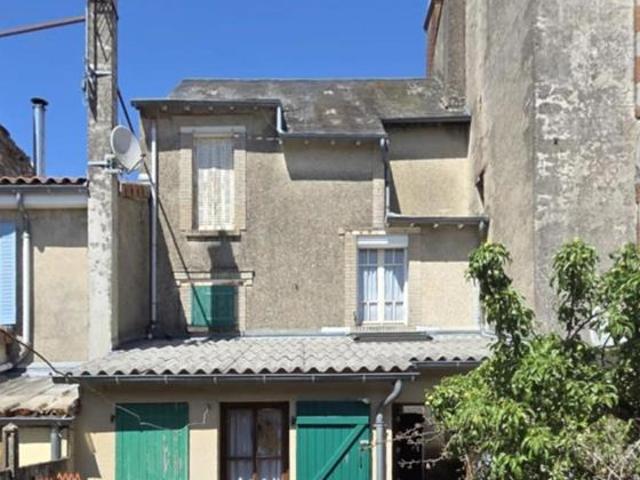Maison de ville avec jardin et dépendance