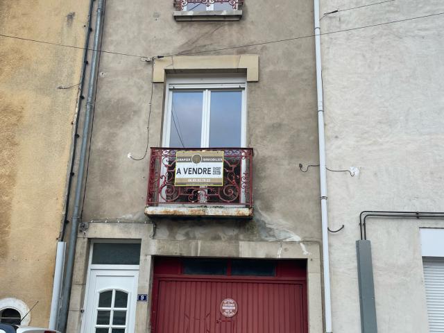 Maison en cœur de ville avec cour et garage