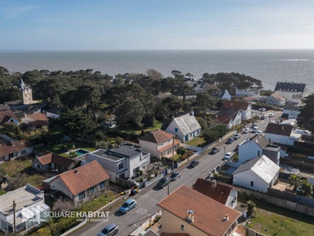 Maison en bord de mer avec jardin