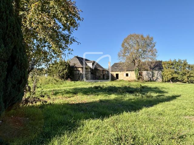 Maison en brasier + grange à rénover