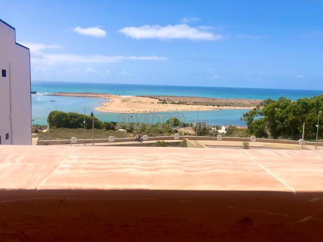 Maison en face de la plage
