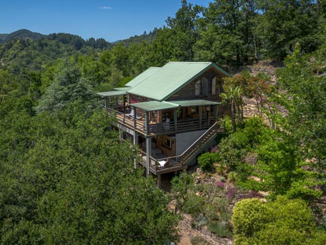 Maison en ossature bois avec vue sur la nature