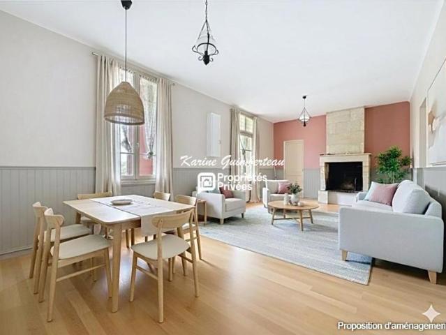 Maison en pierre avec garage et jardin