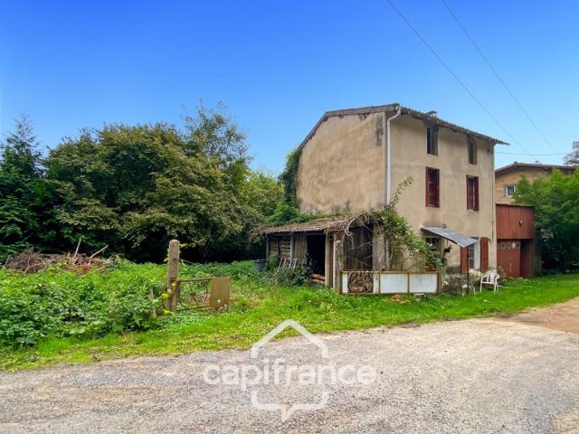 Maison en pierre avec garage et terrain à rénover entièrement Saint Rémy sur Durolle