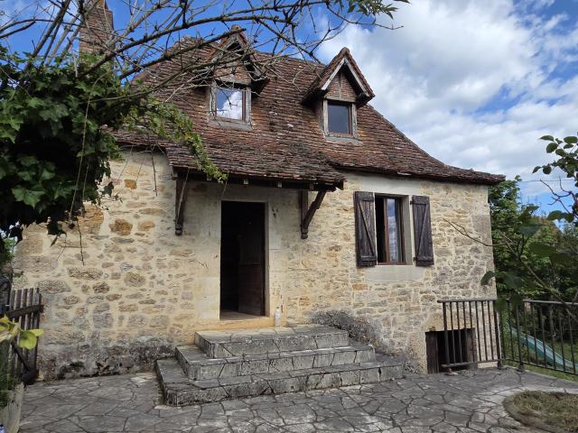 Maison en pierre avec dépendance