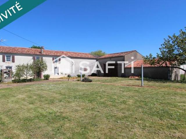 Maison en pierre avec dépendances et terrain