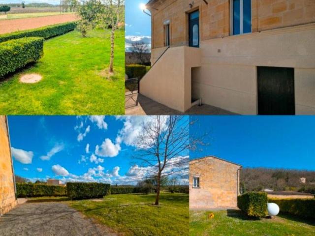 Maison en pierre avec jardin