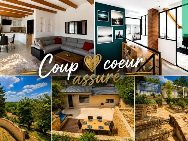 Maison en pierre rénovée avec jardin et garage