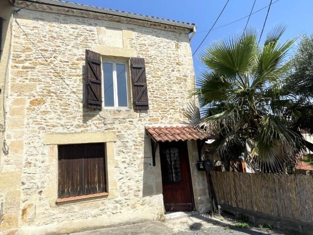 Maison en pierre 85 m2 avec garages et jardin