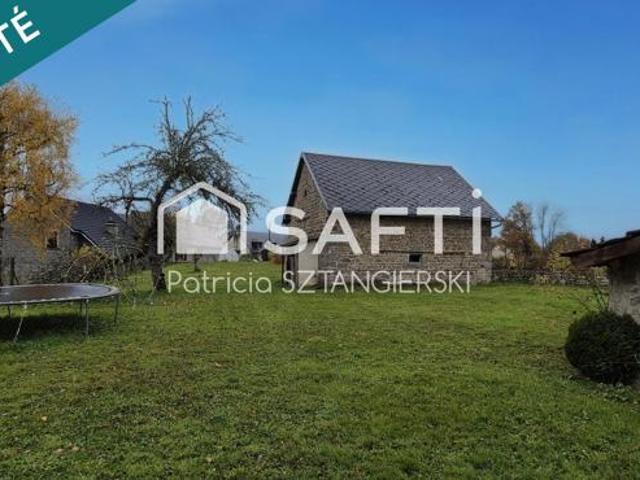 Maison en pierres au calme avec garage et terrain clos