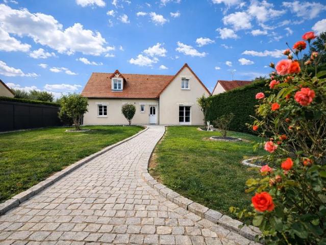 Maison familiale avec jardin, véranda et grand garage