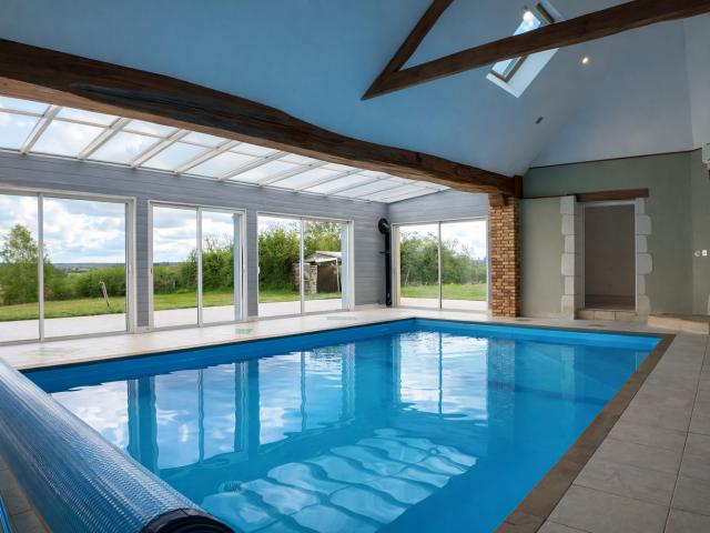 Maison familiale avec piscine intérieure Le Grand Lucé