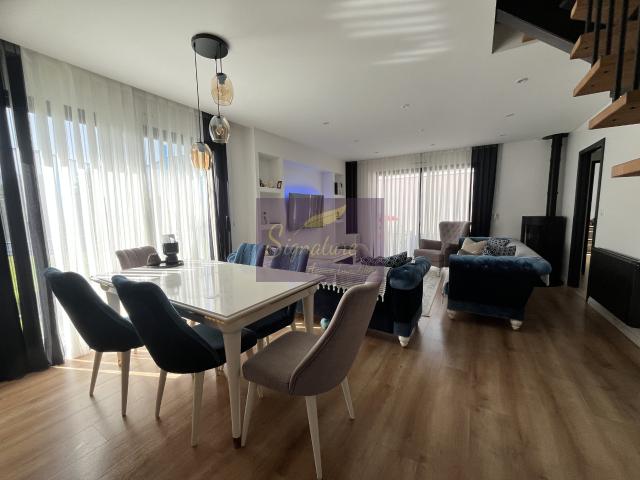 Maison familiale contemporaine T5 avec garage, jardin et terrasse plein soleil et prestations soignées