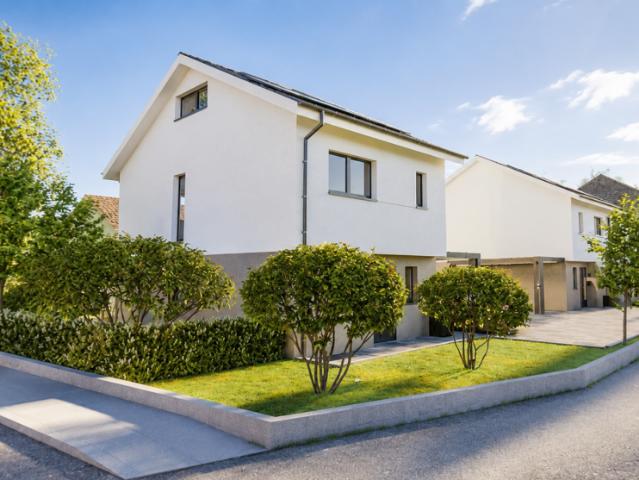 Maison individuelle moderne avec des finitions de haute qualité et un confort de vie intemporel