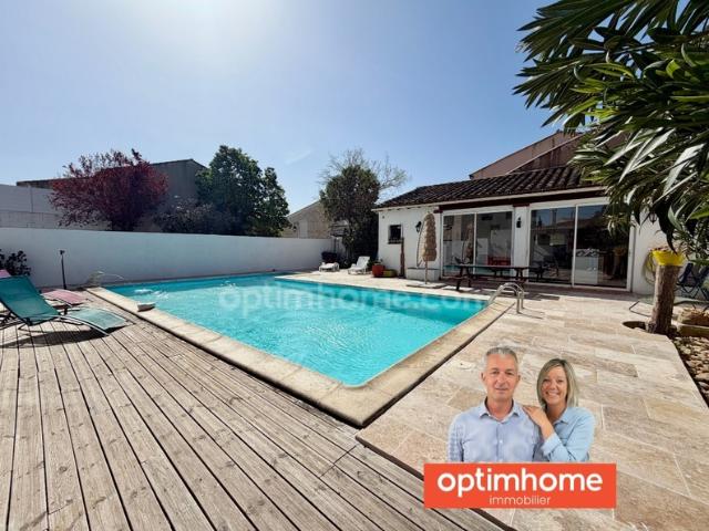 Propriété avec rendement locatif, piscine et garage