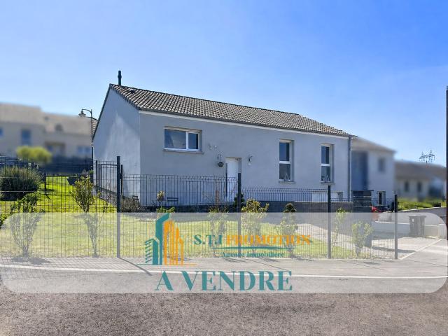 Maison individuelle récente avec jardin plein sud et sous sol complet Lommerange