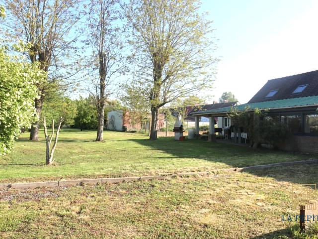 Maison individuelle semi plain pied 4 chambres jardin et garage