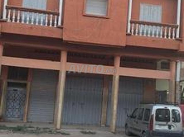 Maison + magasin + 2 étages