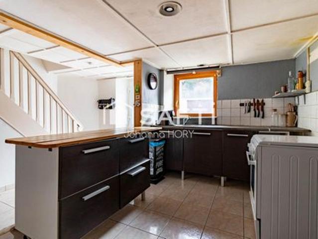 Maison mitoyenne à rénover 216 m2 à Fort potentiel