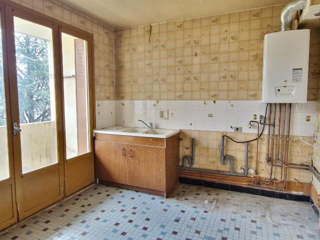 Maison mitoyenne à rénover