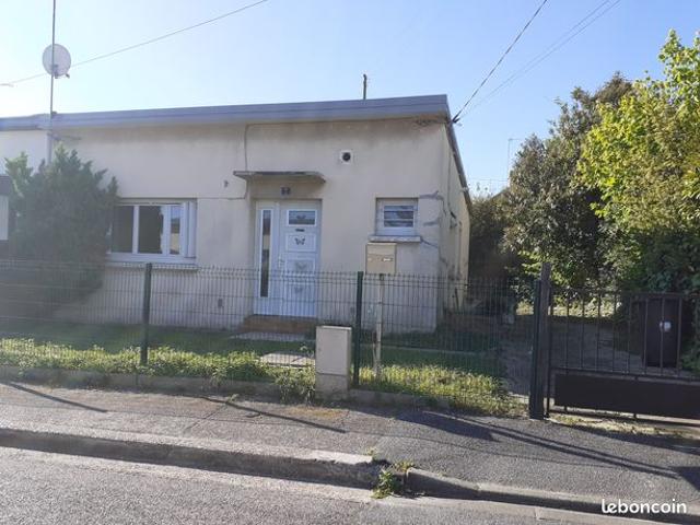 Maison mitoyenne d'un cote