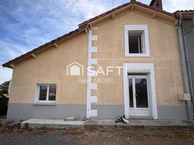 maison mitoyenne entièrement rénovée se composant de trois chambres dont une suite parentale ainsi qu'un grand séjour