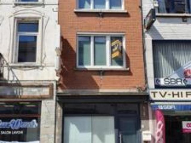 Maison mixte avec rez commercial + 2 ch en centre ville