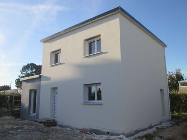 Maison neuve avec jardin