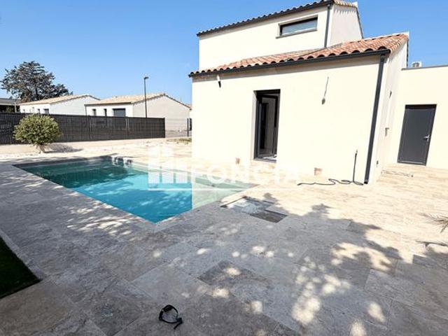 Maison neuve avec jardin est piscine