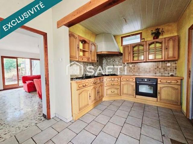 Maison semi individuelle avec jardin et dépendance