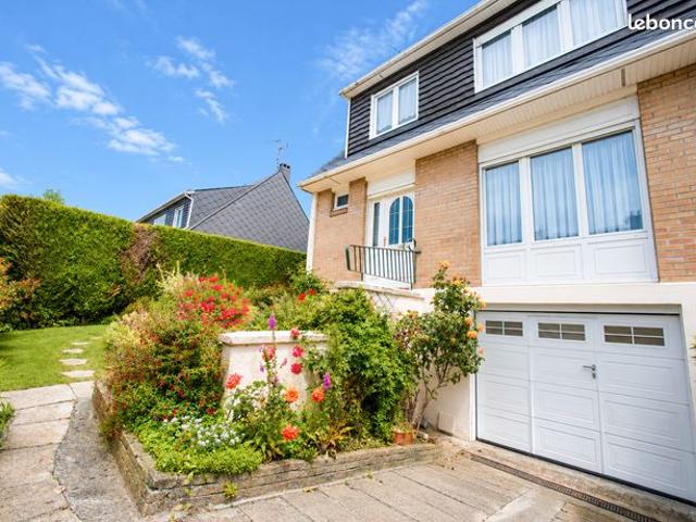 Maison semi individuelle avec sous sol complet et garage