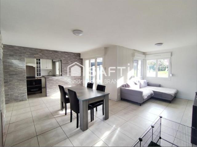 Maison semi individuelle de semi plain pied avec sous sol,3 chambres et jardin