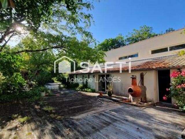 Maison spacieuse avec 3 chambres et jardin arboré