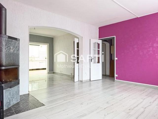 Maison spacieuse avec jardin et garage