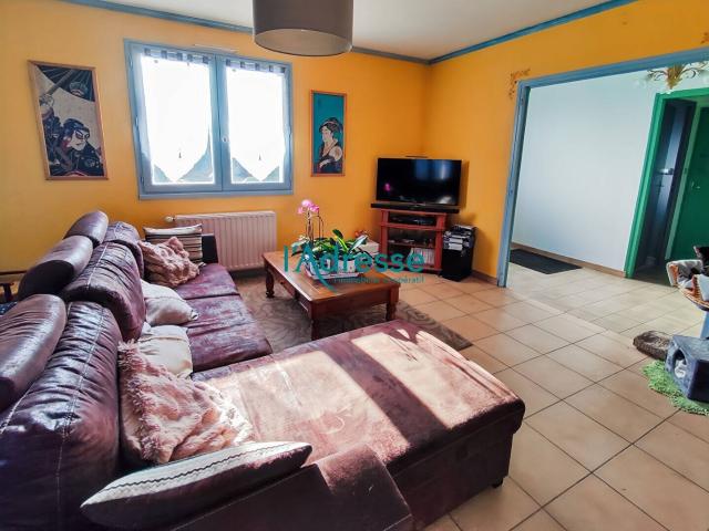 Maison sur demi sous sol