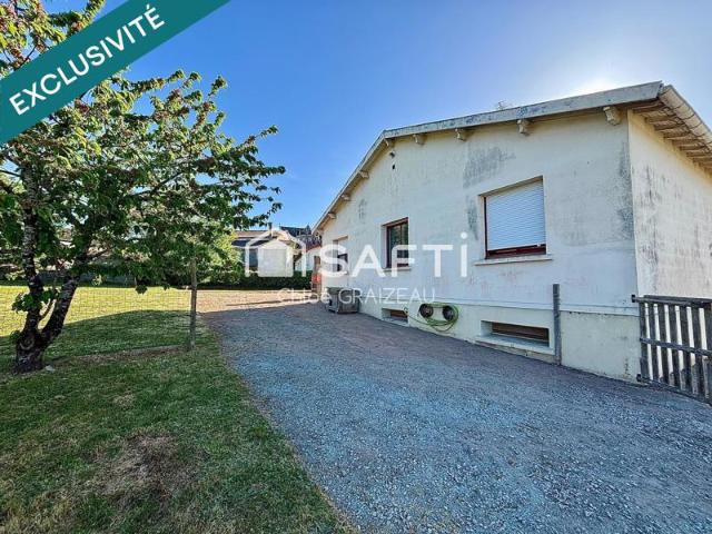 Maison sur demi sous sol, 84 m² habitables, terrain constructible