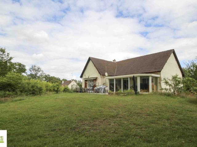 Maison sur sous sol avec jardin