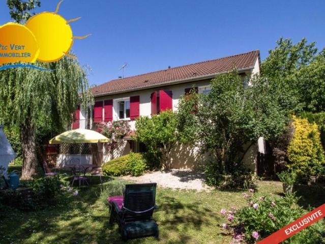 Maison sur sous sol avec terrain arboré