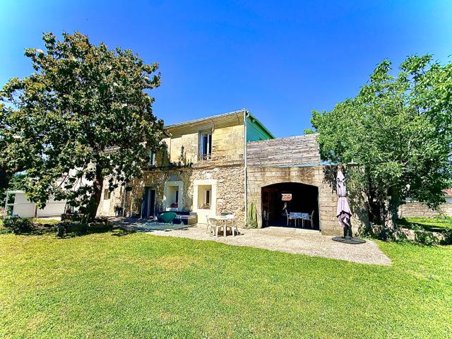 Maison pierre de 145m2 avec jardin paysagé