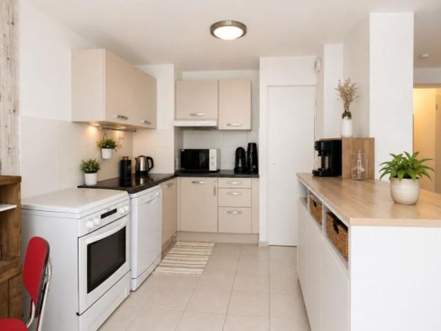Maison plain pied 2 chambres 64 m² garage jardin