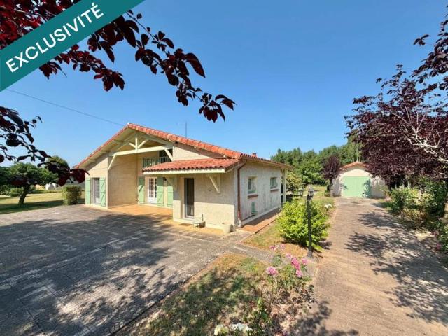 Maison plain pied avec grand garage et terrain clos