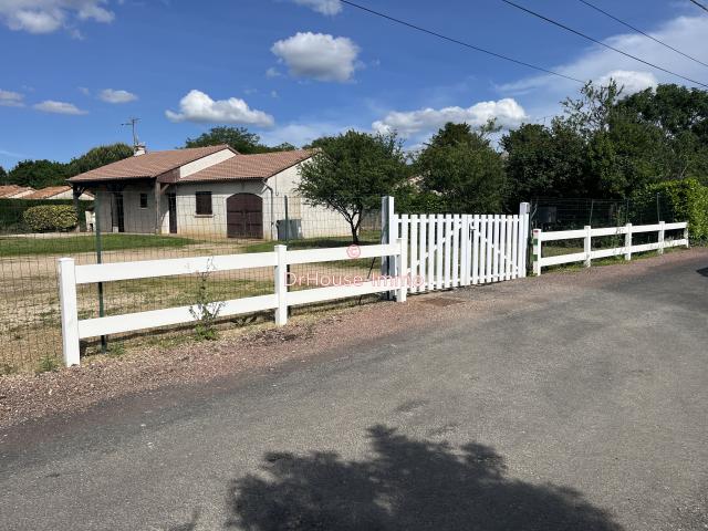 Maison plain pied avec grand terrain constructible à Dissay