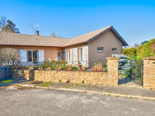Maison plain pied Chasselay d'environ 120 m2 avec sous sol