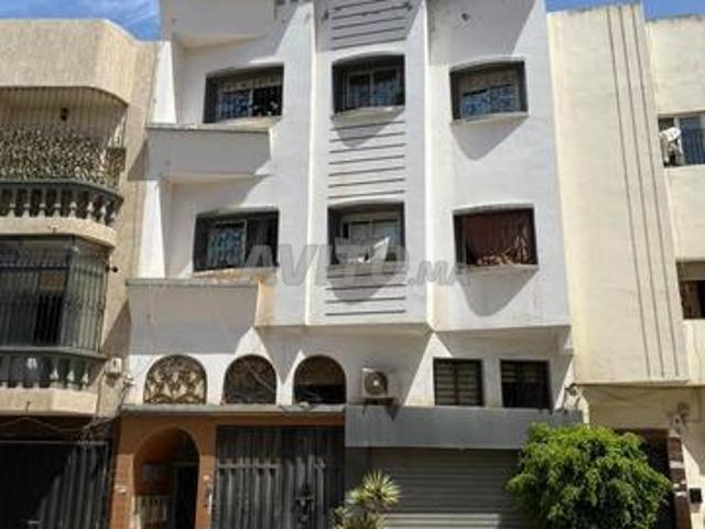 Maison R+2 avec local commercial