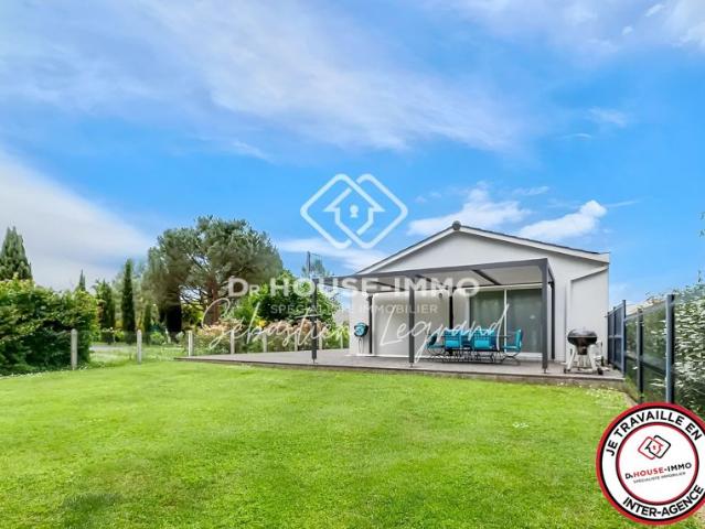 Maison de plain pied avec 3 chambres, garage sur parcelle de 789m²