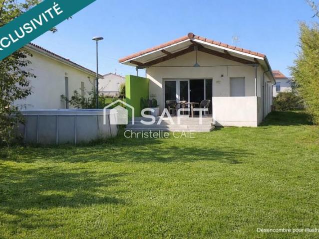 Maison T4 avec jardin et double garage – Investissement sécurisé locataire en place