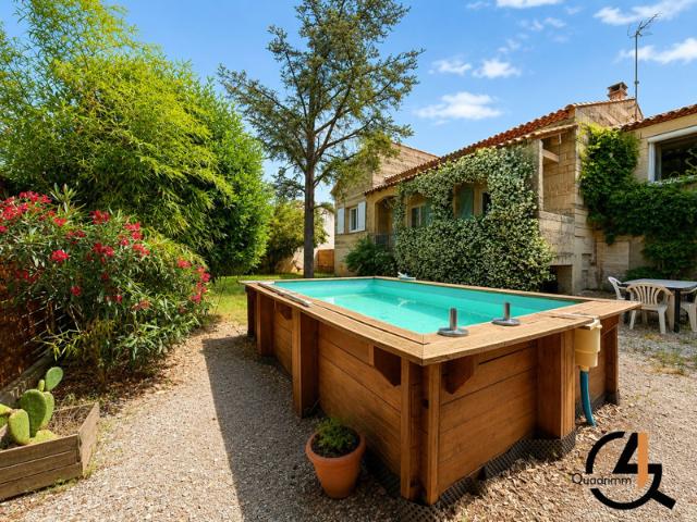 Maison T5 de plain pied avec jardin, piscine et garage Ent